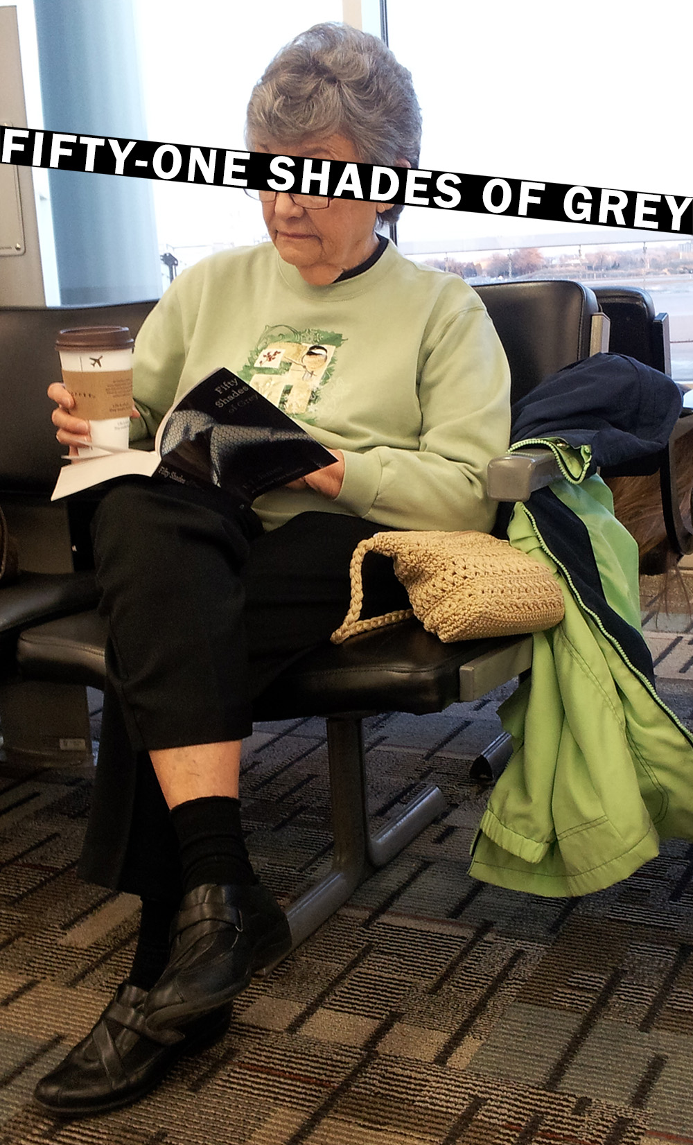 An old woman reads Fifty Shades of Grey in airport.