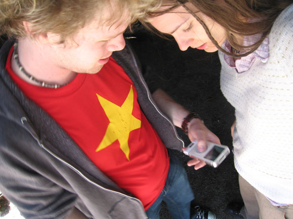 Nathan and I inside of a giant tree, looking at his iPod.