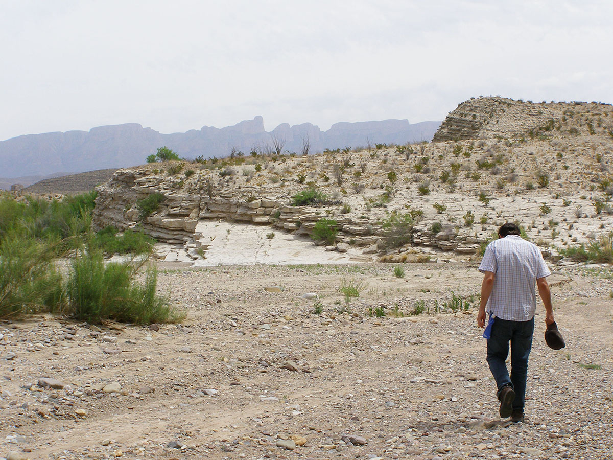 Arthur on the barren landscape.