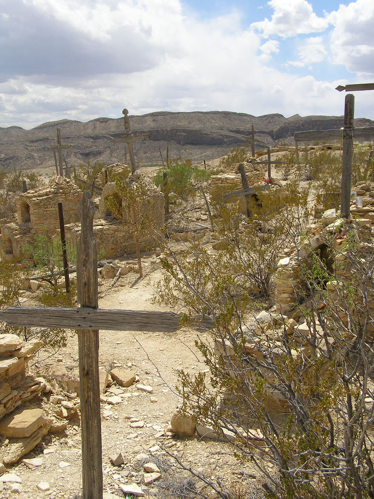 Another shot of the cemetery. Old, natural-color wooden crosses are prominent.