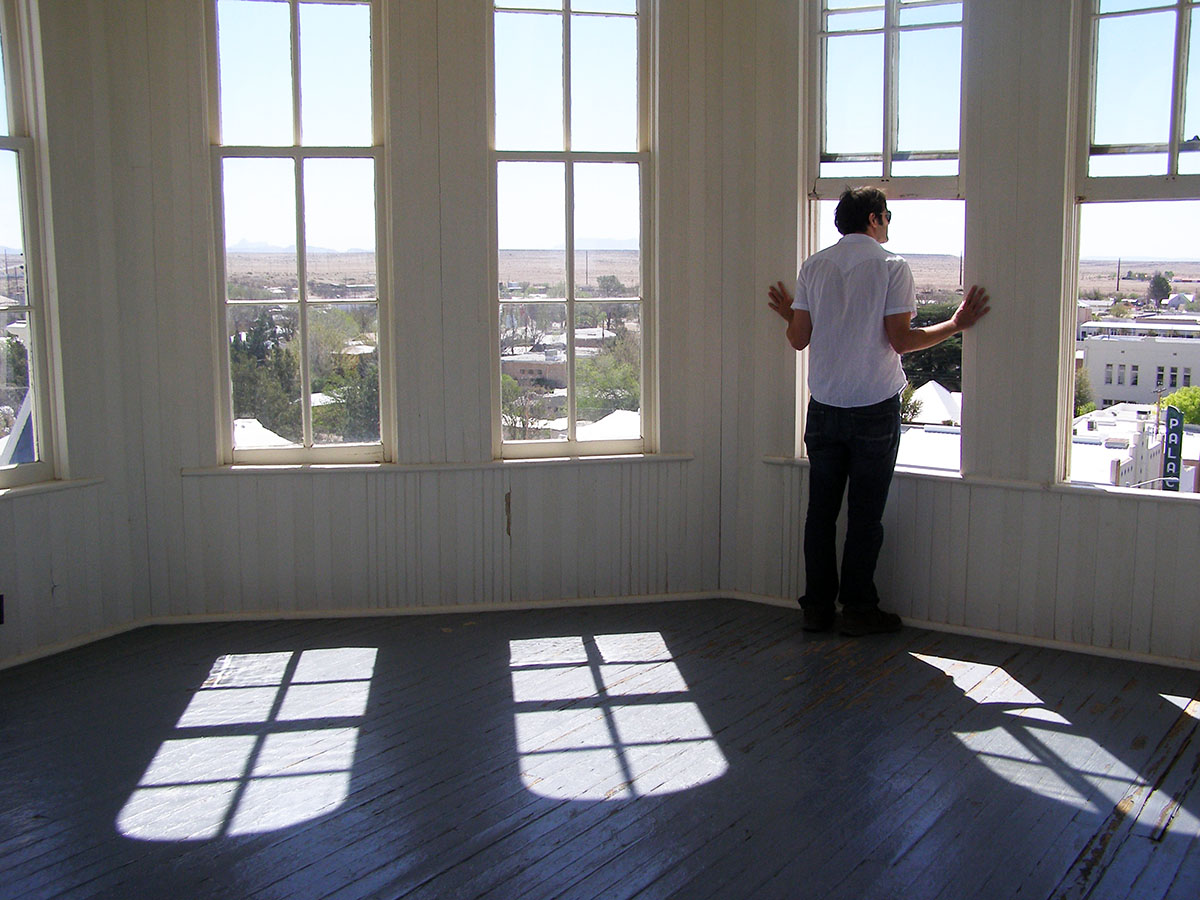 Arthur looking out the window of the town hall observation deck.