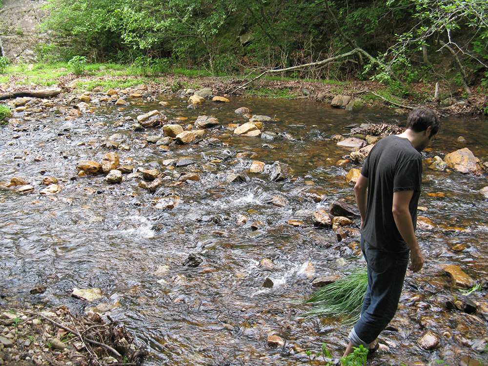 Arthur wading in the creek.