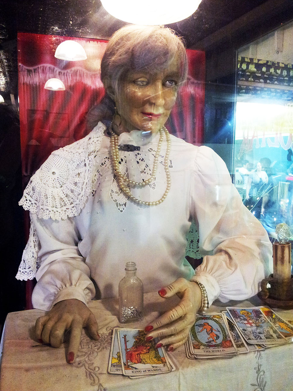 Creepy old granny automaton fortune teller.