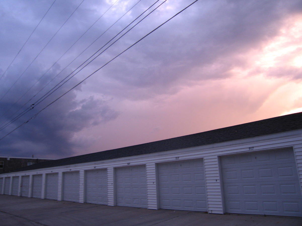 Pastel sunset sky and garages