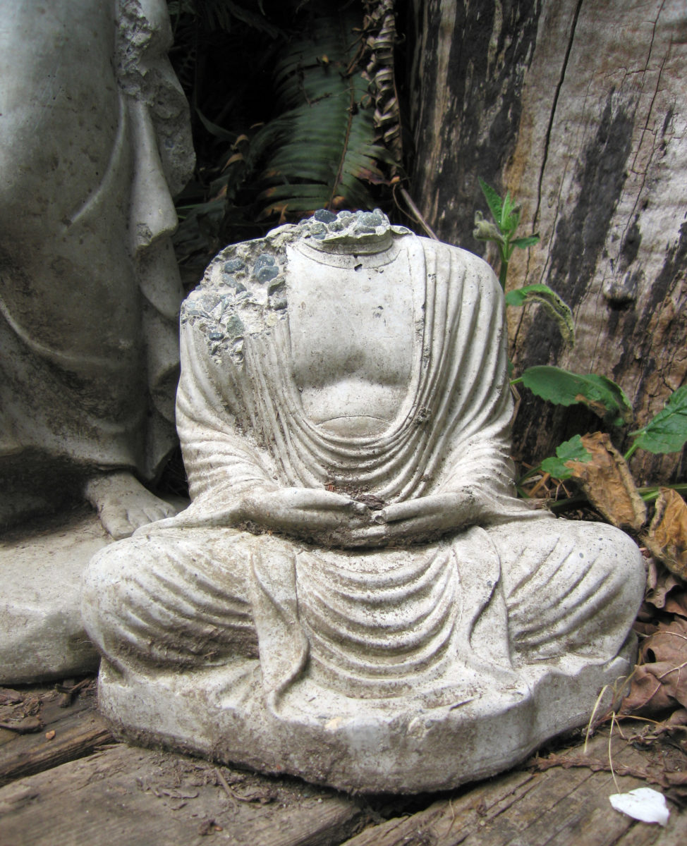 Buddha statue missing its head