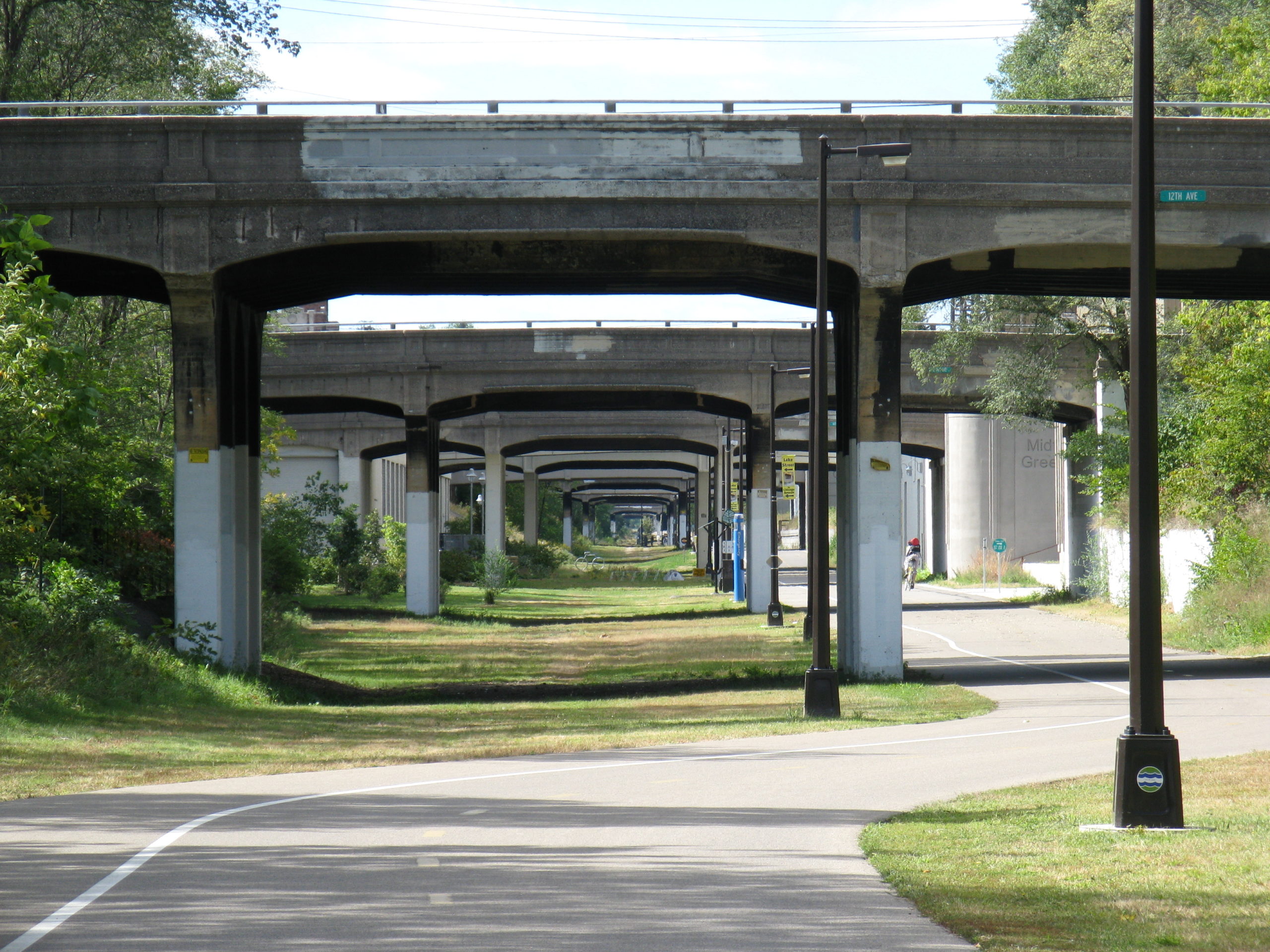 the Midtown Greenway makes the seawall say mercy