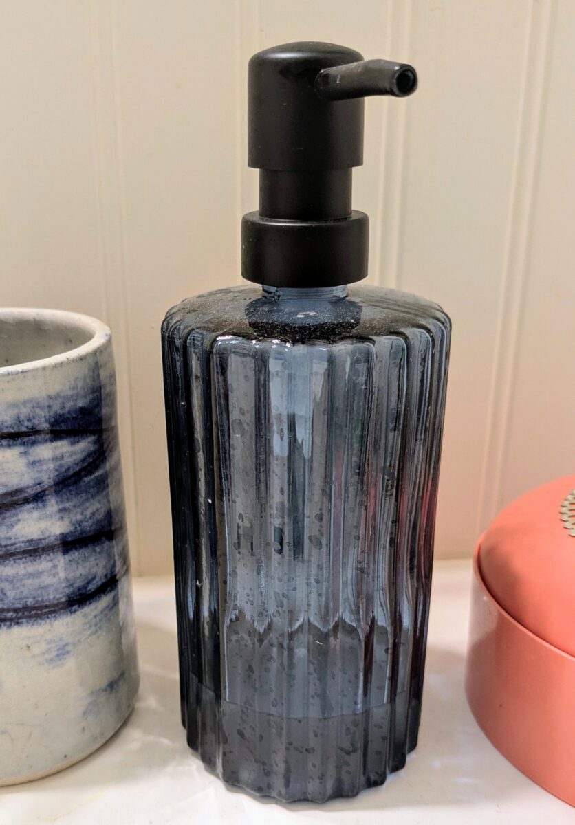 A blue glass soap dispenser from Target.