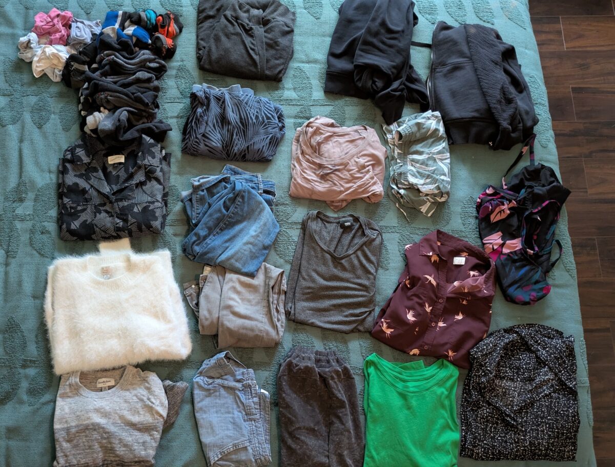 Clothes folded on a bed, all from Target.